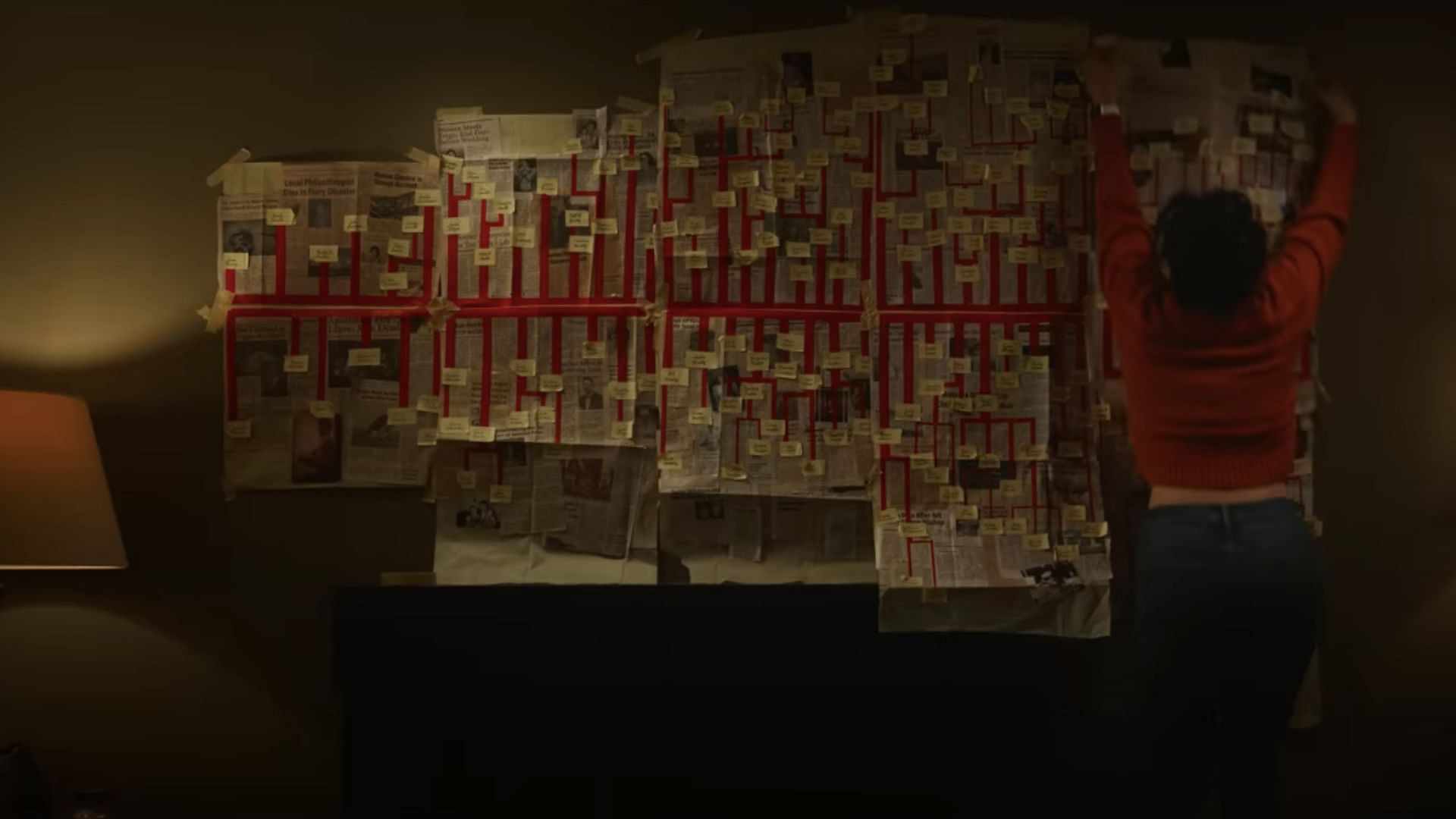 Clear makes a similar wall of clues in the second installment (Image via YouTube/Netflix)
